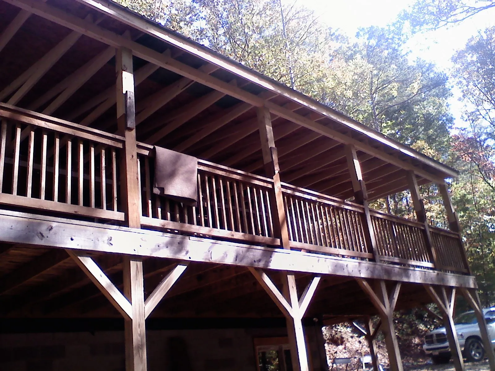 Timber framing under a new elevated porch and deck — Roof Leak Repair in Coral by Roofing Brothers
